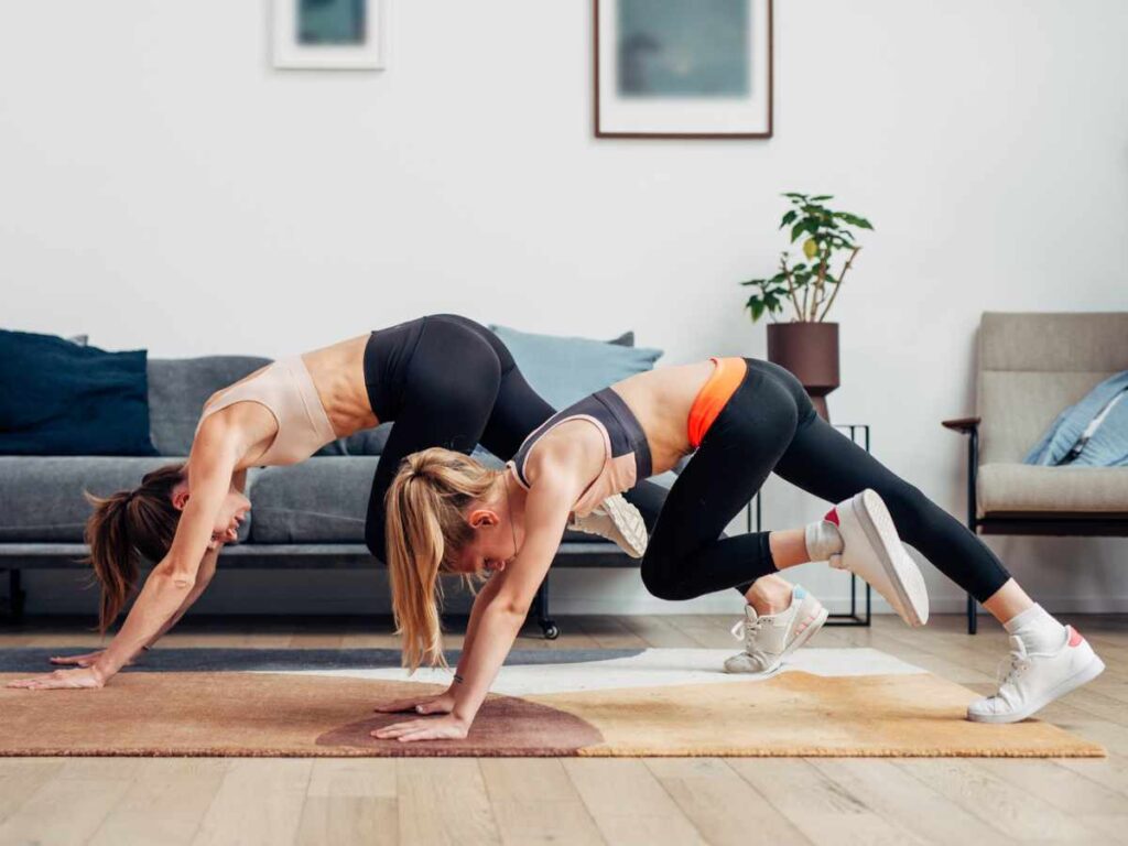 friends doing mountain climber at home