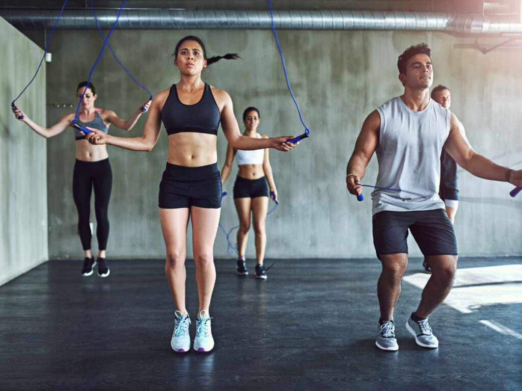 friends doing skipping at the gym