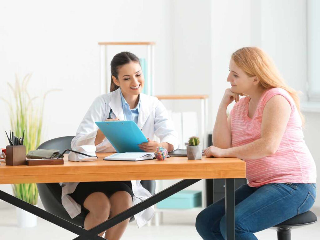 lady consulting with doctor before starting gym