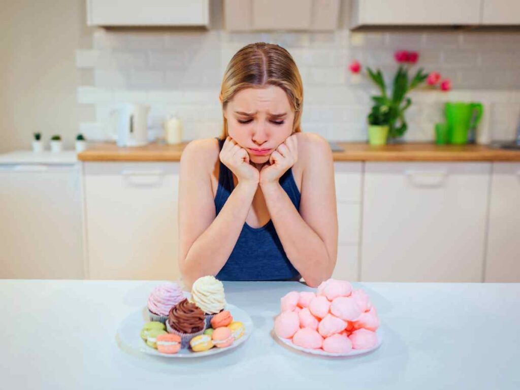 lady avoiding sugary food to avoid tooth decay