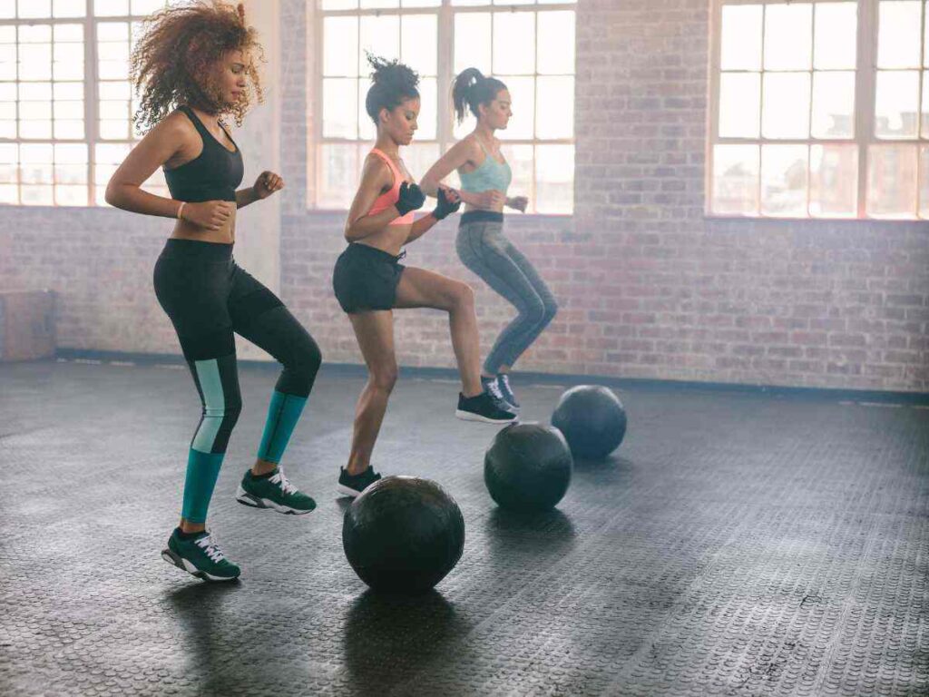 ladies doing aerobics exercise in the gym