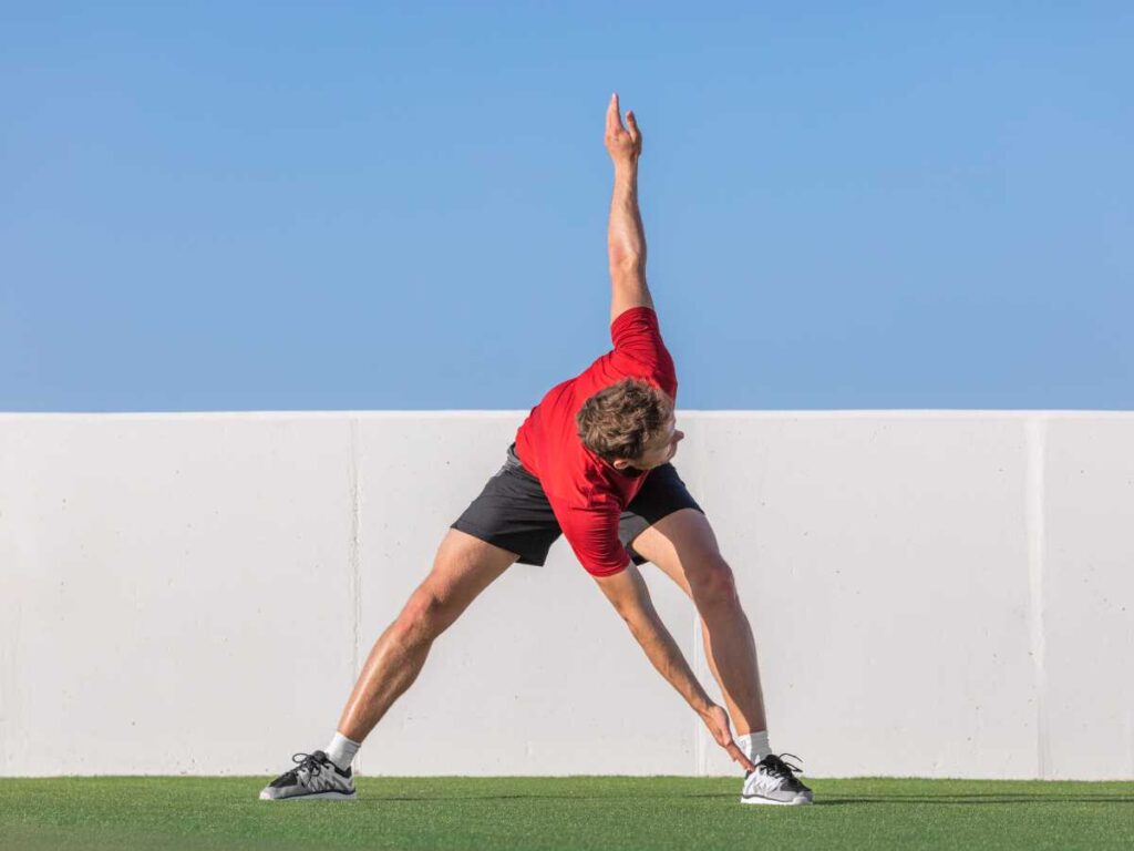 man doing dynamic strechings